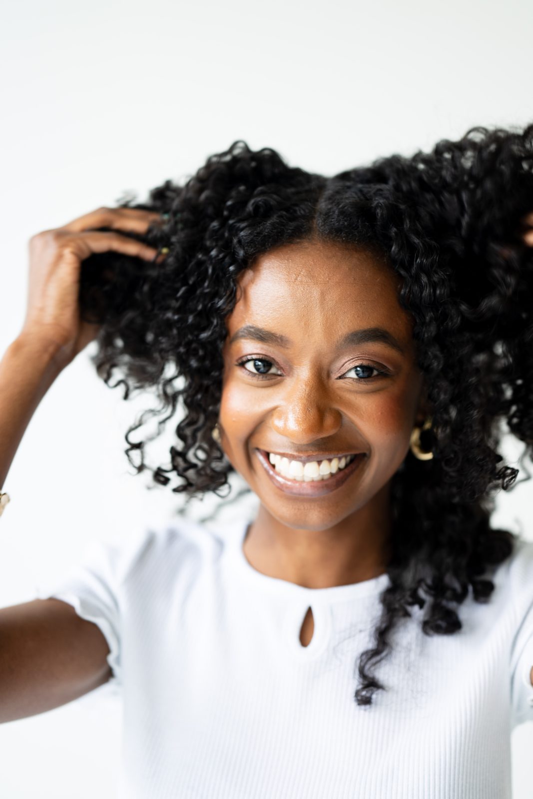 Benita Davis in a healthy-hair consultation with a client